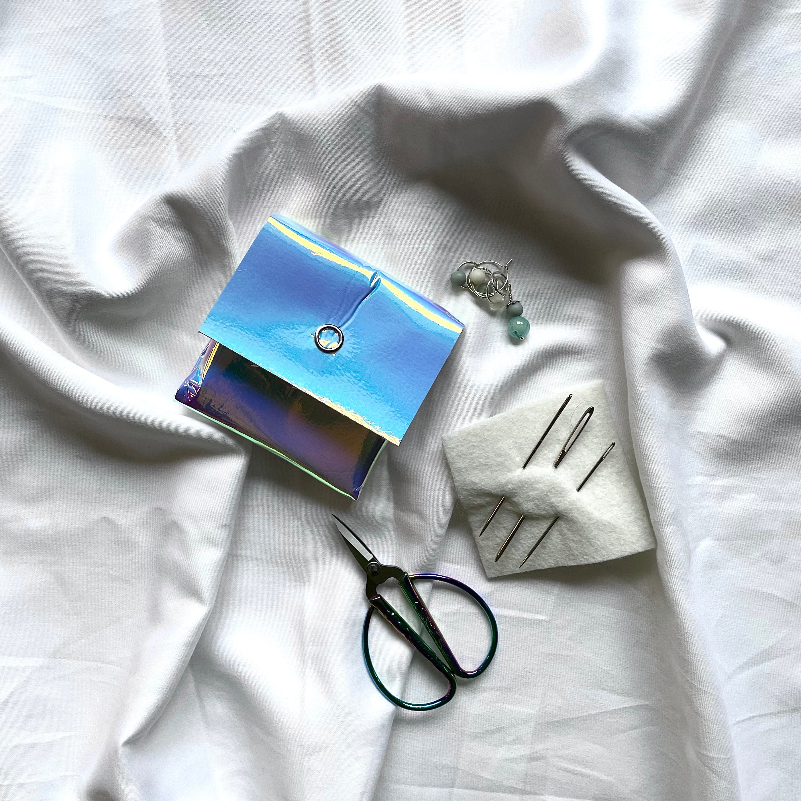 Holografisk pung med tilbehør